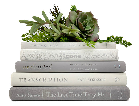 gray and white decorative books by color for home staging