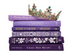 Purple decorative books. Color-coded book stack by the shelf foot.