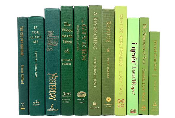 Emerald, chartreuse, jade, lime, forest, moss green decorator books. Color-coded book stack by the shelf foot.  Edit Your Home Decor.